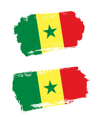 Set of two creative brush painted flags of Senegal country with solid background