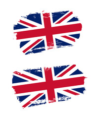 Set of two creative brush painted flags of United Kingdom country with solid background