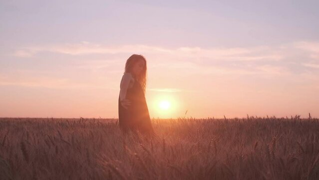dramatic choreography dance on the wheat field in sunset light