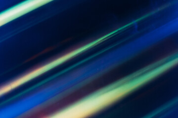 Defocused glow overlay. Neon light flare. Futuristic illumination. Blur LED navy blue green pink color lines glare dust scratches on abstract background.