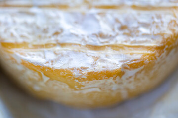 Camembert close-up. Macro photography of cheese for the cover. Camembert advertisement. Cheese for the cover. Brie advertisement. Brie close-up. Cheese with mold close-up. Camembert briquettes. Cheese
