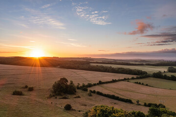 Gorgeous aerial drone landscape image of South Downs NP at sunrise in Summer