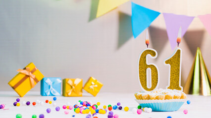 Happy birthday card from candles with the number 61, golden numbers from candles for...