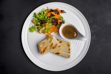 Grilled squid with salad and plum sauce