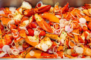 Delicious lobster salad close-up with onion, a light fresh dish. Recipe for parties, wedding banquets, events. Italian food.Close up