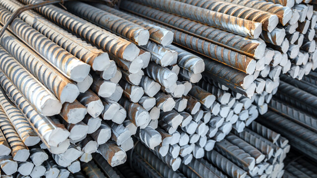 Reinforcement steel rod and deformed bar with rebar at construction site. stack armature