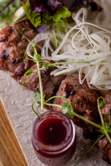 Pork shashlik with onions in pita bread.