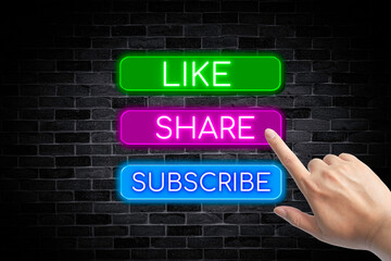Like, Share, Subscribe neon banner with a hand on a brick wall background.	