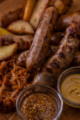 Grilled pork sausages with glass of beer