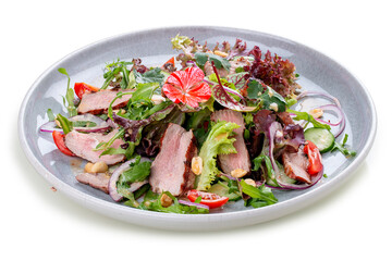 Josper-oven veal salad with sauce. On a white background, isolated.