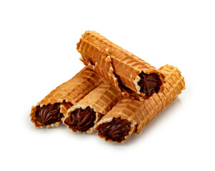 Wafer tubes filled with condensed milk cream. On a white background, isolated.