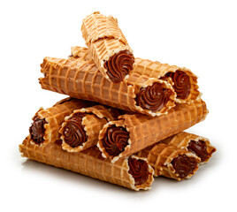 Wafer tubes filled with condensed milk cream. On a white background, isolated.