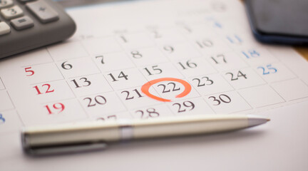Monthly calendar with red mark on the 22th