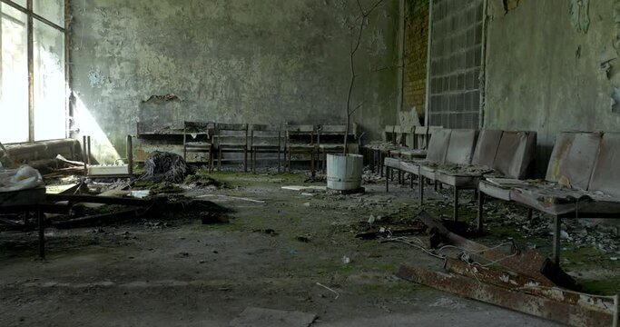 Abandoned ruined reception area in Pripyat hospital 