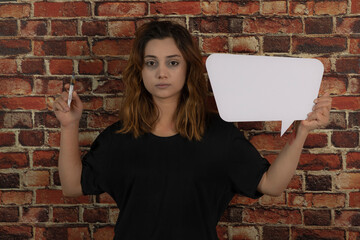Young addicted girl holding injection and white idea board