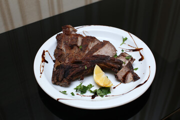 delicious appetizing veal meat steak served on a dish in an expensive restaurant from the chef