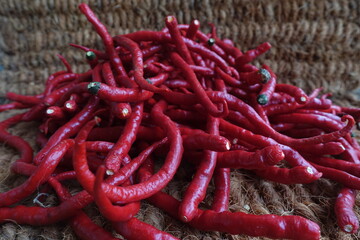 Red Chili is a fruit and plant member of the genus Capsicum