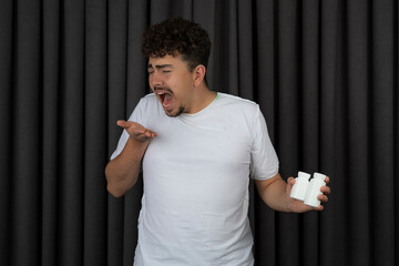 A depressed young guy taking pills and commits suicide