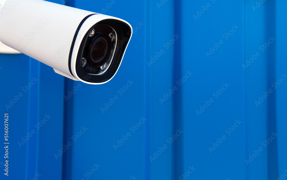 Poster cctv surveillance camera in factory area to control security system area with torch light and copy s