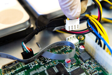 technician or engineer installs hard drive in cctv, cctv system