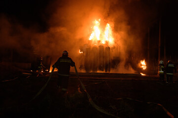 Burning transformer at the railway station after the missile attack in Ukraine