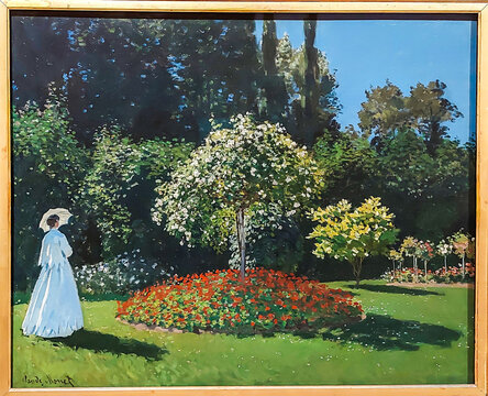Painting by Claude Monet "Woman in the garden".  Exhibition "The Birth of Modern Art: Sergey Shchukin's choice" in  the State Hermitage museum. St. Petersburg, Russia
