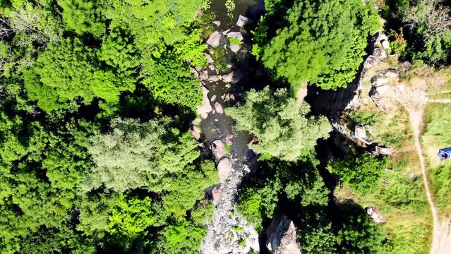 Drone shot Butsky Canyon Ukraine. Aerial view of a rocky canyon on the Gorny Tikich River near the village of Buki. River Gorny Tikich in Proterozoic granites. Ancient deep and narrow canyon 