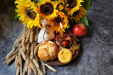 Wiccan Altar for Lammas, Lughnasadh pagan holiday. ears of wheat, bread, flowers, apple, minerals,...