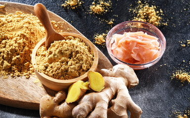 Bowls with marinated and ground ginger and its fresh rhizome