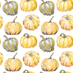 Seamless hand drawn pattern of ripe yellow pumpkins and green leaves on a white background. Design for wallpaper or textile of harvest festival or halloween party.