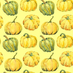 Seamless hand drawn pattern of ripe yellow pumpkins and green leaves on a yellow background. Design for wallpaper or textile of harvest festival or halloween party.