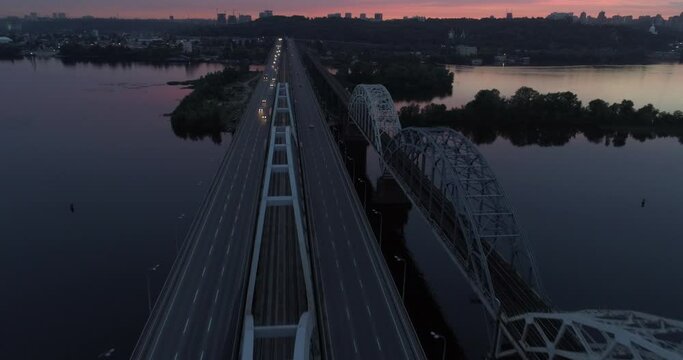 Sunset aerial view on a Darnitsky Bridge in Kyiv,Ukraine