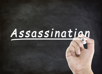 assassination wording with hand writing