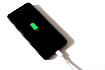 100% battery charged smartphone on the white background