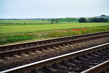 railroad track with field view