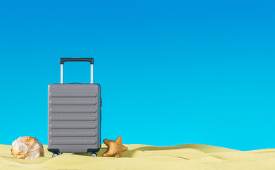 Blue summer vacation luggage display on beach side on yellow sand travel banner design background 3d rendering image