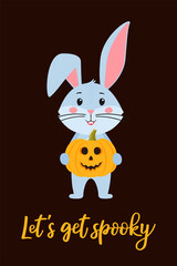 Obraz na płótnie Canvas Halloween greeting card template with a cute rabbit with jack'o'lantern pumpkin, the symbol of the year 2023 according to the Chinese calendar. Vector stock illustration with Handwritten text