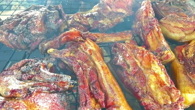 Pork cut lengthwise. The meat is fried and ready to eat. The video was taken at a restaurant on the side of the road in Tuaran, Sabah.