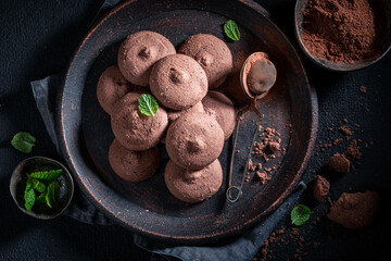Round chocolate shortbread cookies as a Danish sweet dessert.