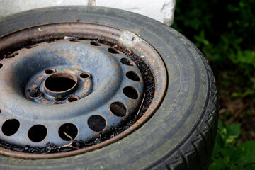 old rusted car tire