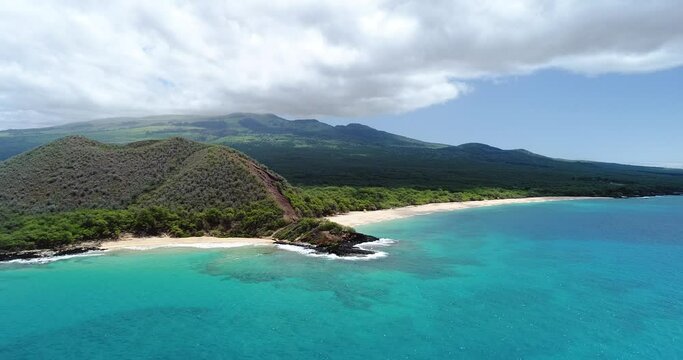 The Incredible Aerial View of Makena Beach AKA Big Beach on Maui, Hawaii. Filmed in Cinema 4K at 60 Frames per second for smooth slow motion or regular speed playback.