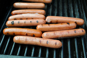 Hotdogs Cooking on a Grill for a Quick Meal	