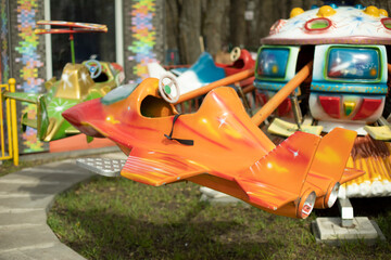 Obraz na płótnie Canvas Children's attractions in park. Play plane for kids.