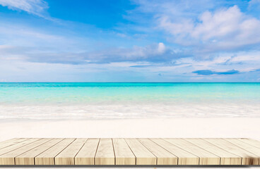Fototapeta premium Top of wood balcony table with seascape and palm leaves, sea and sky at beach