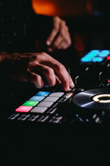 DJ playing his set at night in a Brazilian club