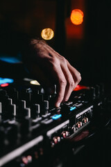 DJ playing his set and shaking the night at Brazilian beach club