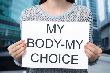 abortion protests, a woman holding a poster my body is my choice, a demonstration of activists at a...