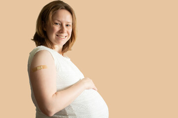 vaccination in pregnancy, pregnant woman after covid 19 vaccine smiling, health and medicine, isolated, protection against viruses and diseases, immunization - obrazy, fototapety, plakaty