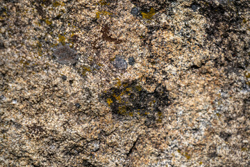 old stone texture with cracks and scratches which can be used as a background