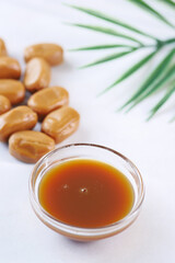  caramel chocolate bar and liquid on table top view 